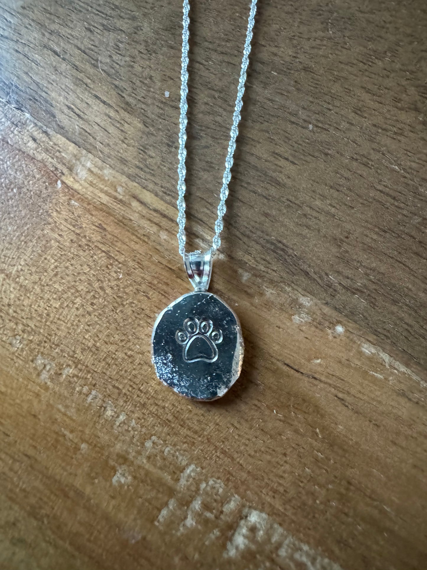 Sterling silver paw print necklace